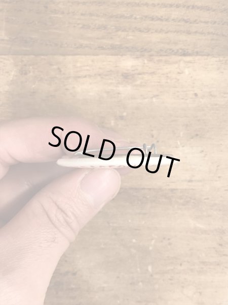 80'sのOutrageously Buns Bodaciousのメッセージが書かれたビンテージの缶バッジ