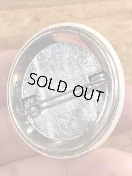 80年代頃のOutrageously Buns Bodaciousのメッセージが書かれたヴィンテージの缶バッチ