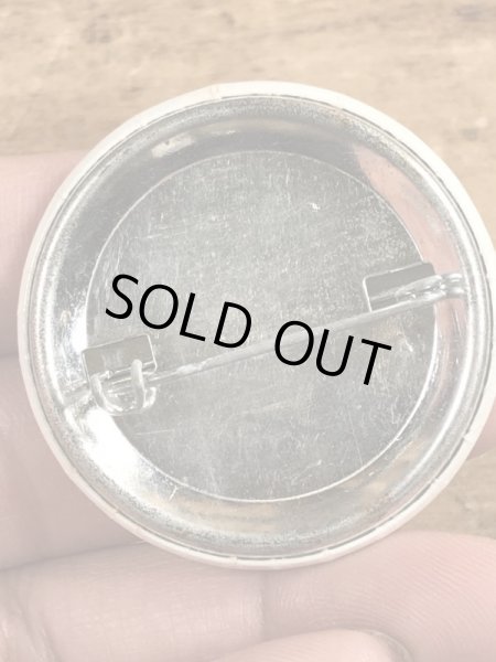 80'sのOutrageously Buns Bodaciousのメッセージが書かれたビンテージの缶バッジ