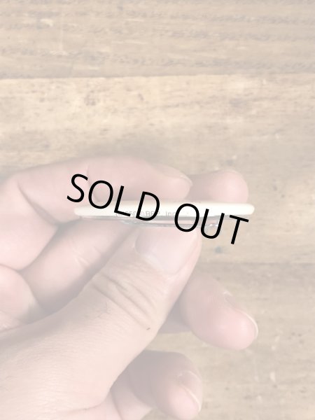 80'sのサンドラボイントンのイラストが描かれたヴィンテージの缶バッチ