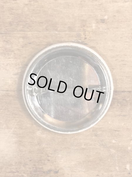 80'sのOutrageously Buns Bodaciousのメッセージが書かれたビンテージの缶バッジ