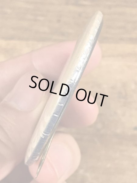 70年代頃のメッセージが書かれたビンテージの缶バッジ