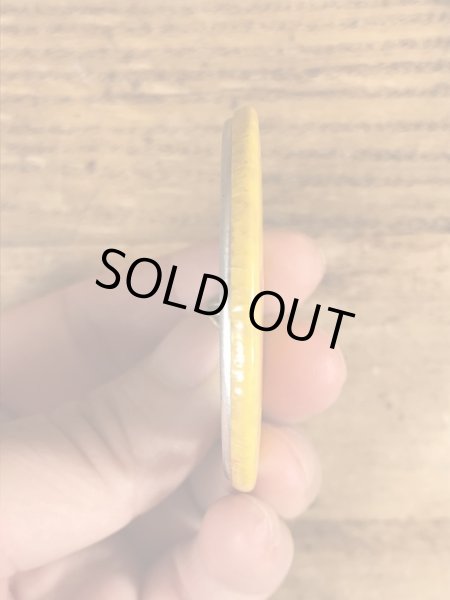 70年代頃のメッセージが書かれたビンテージの缶バッジ