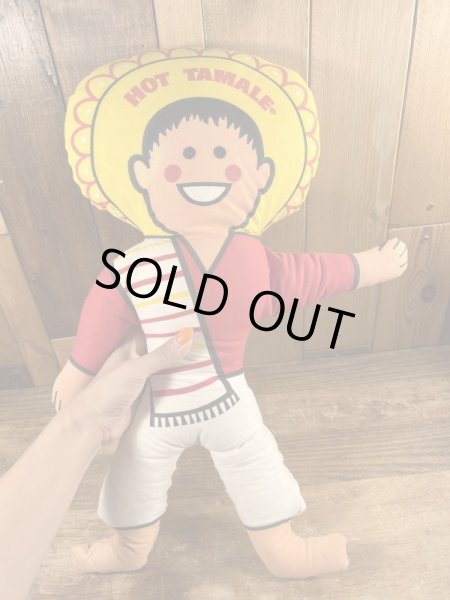 企業キャラクターのホットタマレキッドのぬいぐるみ