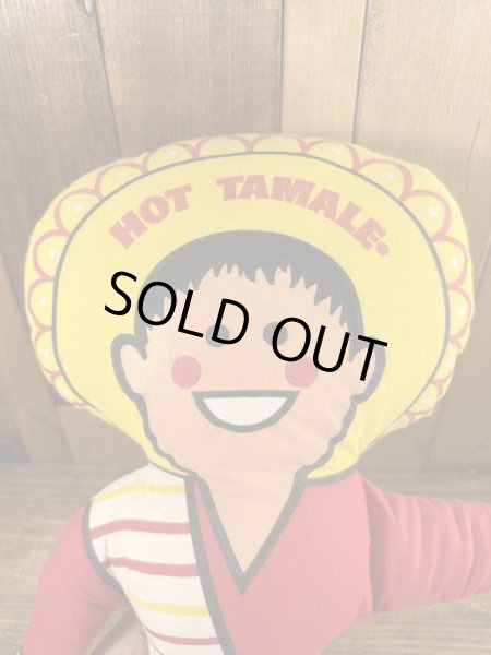 企業キャラクターのホットタマレキッドのぬいぐるみ