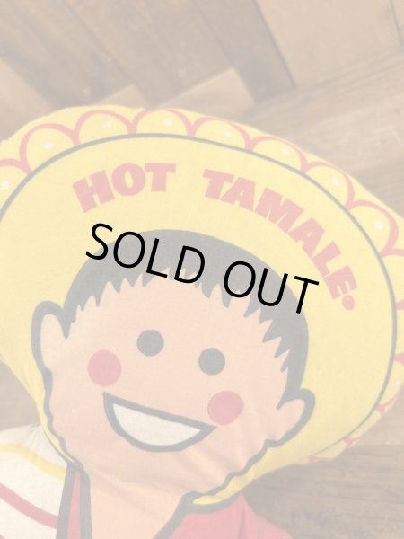 企業キャラクターのホットタマレキッドのぬいぐるみ