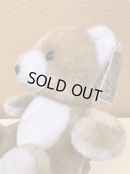 ビンテージの ベージュのくまのぬいぐるみ