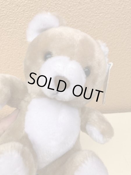 ビンテージの ベージュのくまのぬいぐるみ