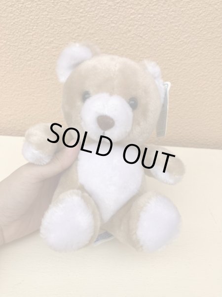 ビンテージの ベージュのくまのぬいぐるみ