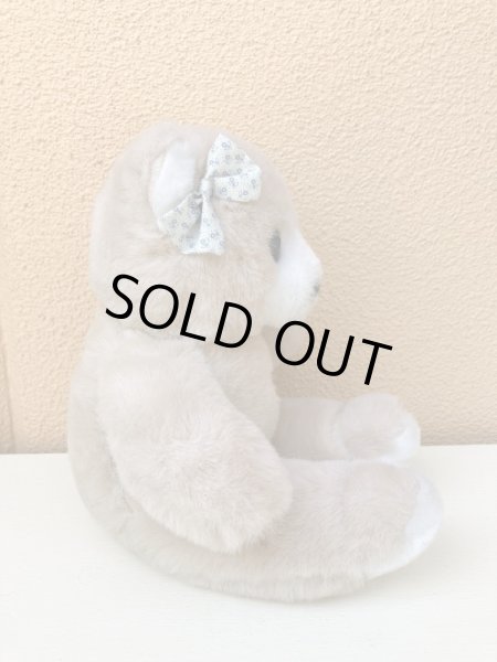 リボンを付けたビンテージのテディベア