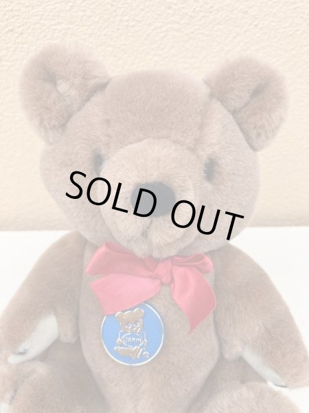 赤いリボンがかわいいビンテージのテディベア