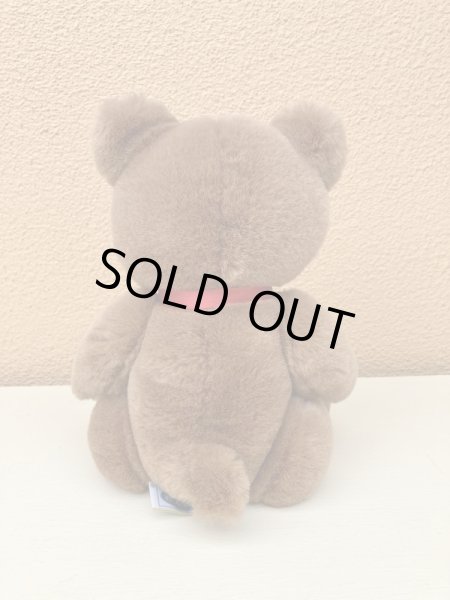 赤いリボンがかわいいビンテージのテディベア