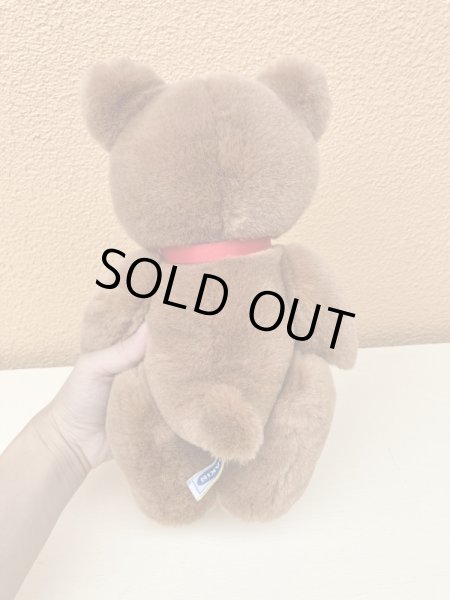 赤いリボンがかわいいビンテージのテディベア