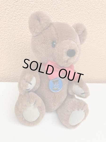 赤いリボンがかわいいビンテージのテディベア