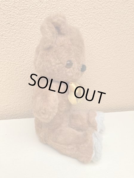 リボンの付いたビンテージのオールドテディベアのぬいぐるみ